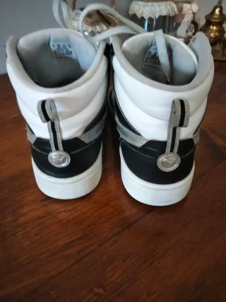 Scarpe Puma alte bianche e nere