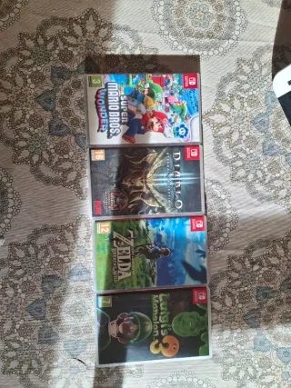 Nintendo Switch OLED Blanca + 4 Juegos