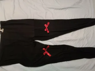 Leggings neri con tulle e fiocco