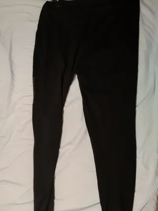 Leggings neri con tulle e fiocco