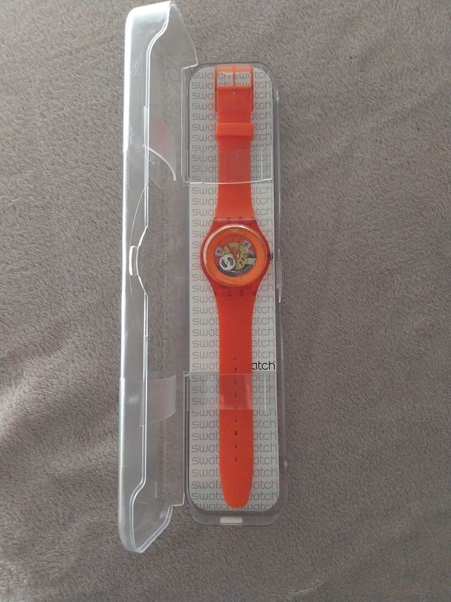 Reloj Swatch SUOO100 Naranja