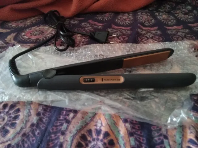 Plancha de pelo Remington negra y dorada
