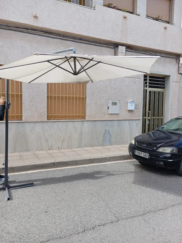 Parasol blanco de tela