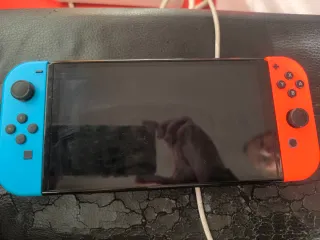 Nintendo Switch OLED Azul/Naranja