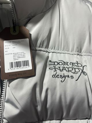 PLUMIFERO ED HARDY.  NUEVO