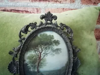 Cornice ovale vintage in metallo