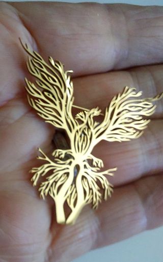 Broche ave fénix chapado en oro joyas bisutería 