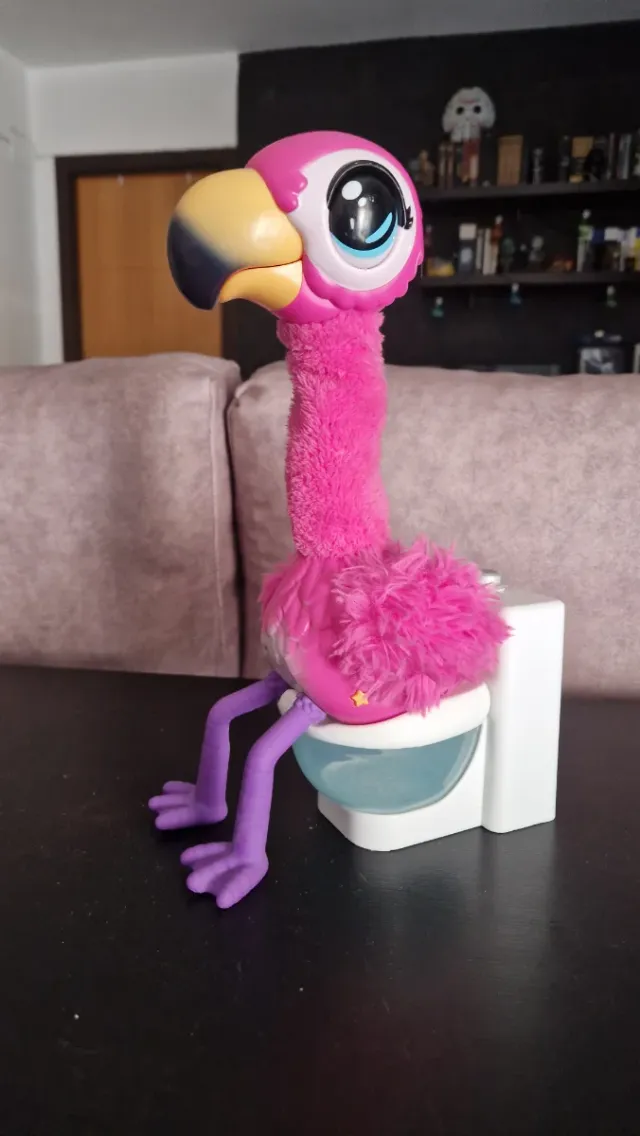 Giocattolo Fenicottero canta e vai in bagno