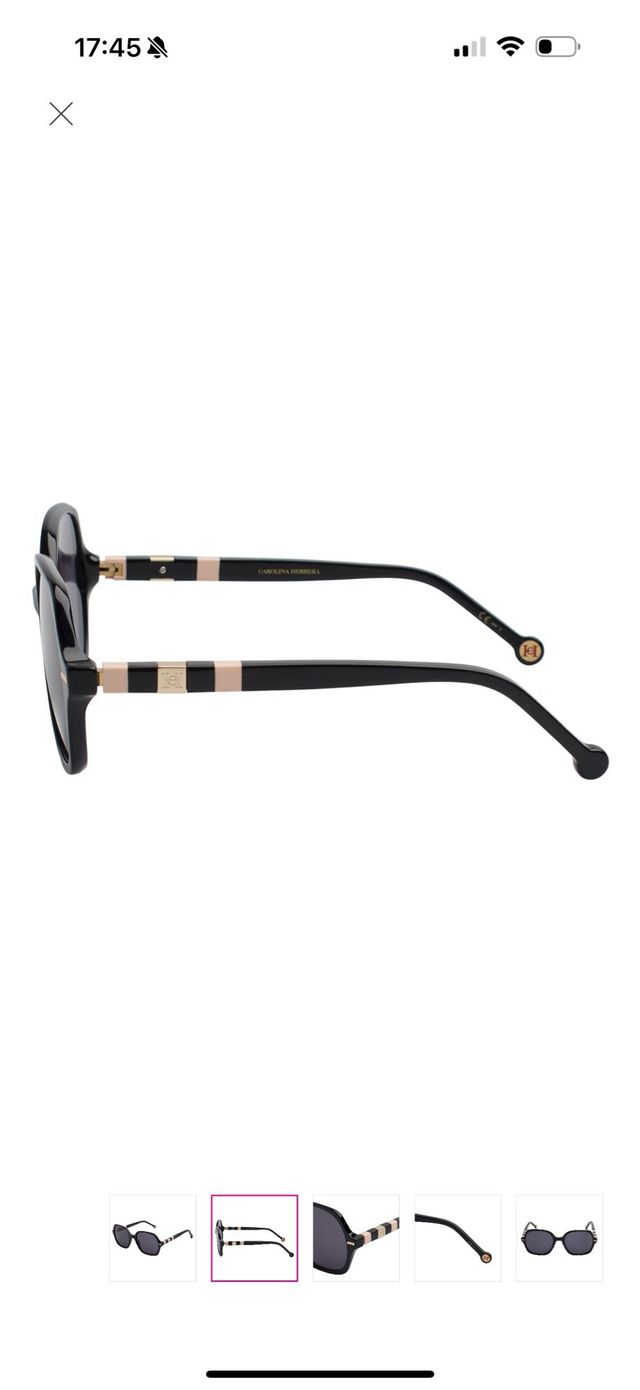 Gafas de sol Carolina Herrera negras y doradas