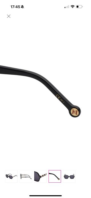 Gafas de sol Carolina Herrera negras y doradas