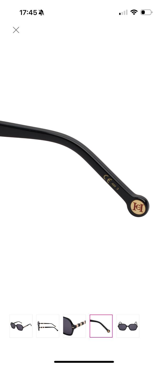 Gafas de sol Carolina Herrera negras y doradas