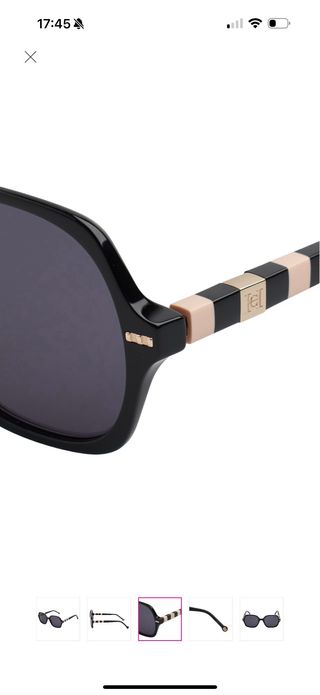 Gafas de sol Carolina Herrera negras y doradas