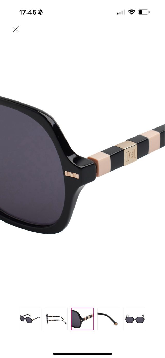 Gafas de sol Carolina Herrera negras y doradas