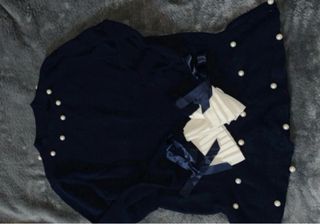 Jersey azul marino con perlas