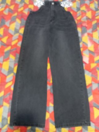 Pantaloni palazzo baggy con catene