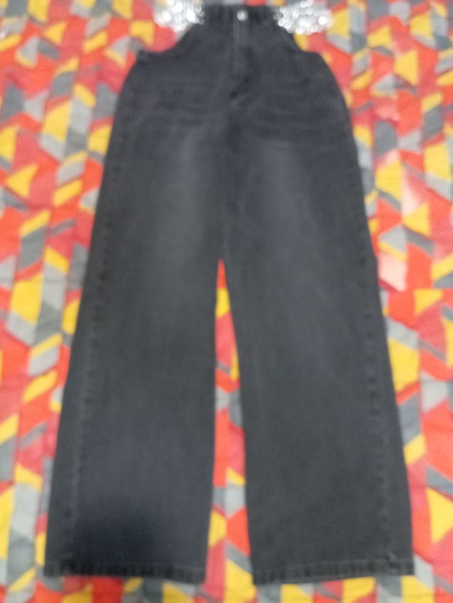 Pantaloni palazzo baggy con catene