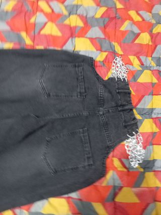 Pantaloni palazzo baggy con catene