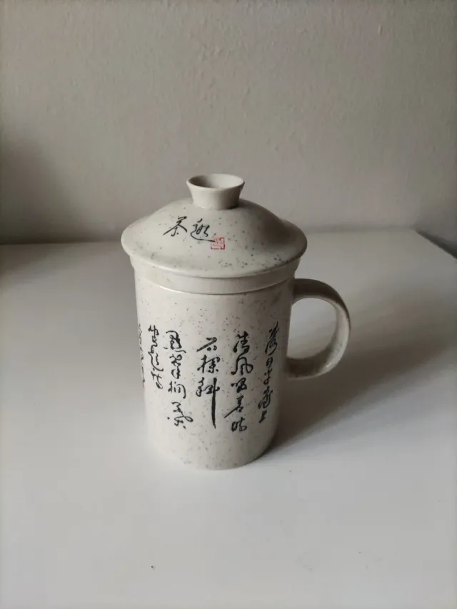 Taza de té con filtro de cerámica