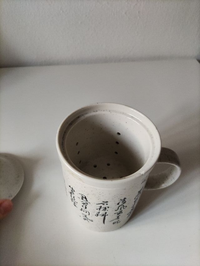 Taza de té con filtro de cerámica