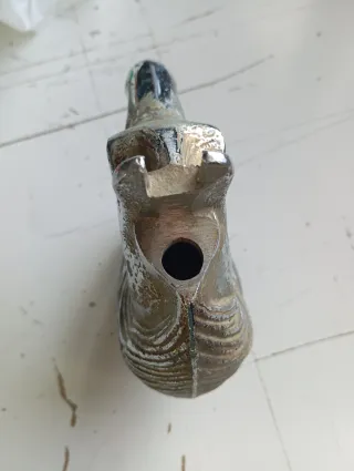 Cabeza de caballo de bronce