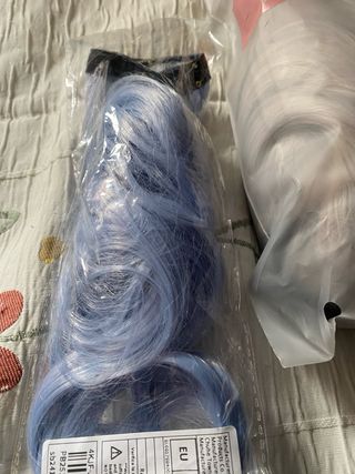 Extensión de clip y peluca sintética