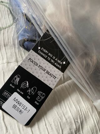 Extensión de clip y peluca sintética