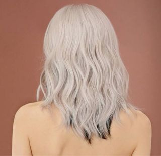 Extensión de clip y peluca sintética