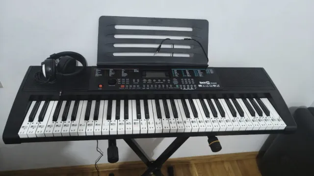 Teclado RockJam con auriculares