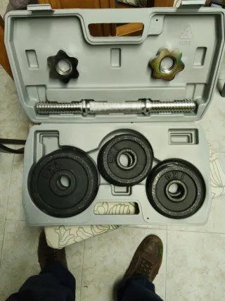 Estuche de pesas con discos y barras