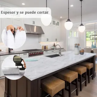 Papel adhesivo marmol blanco con vetas grises.