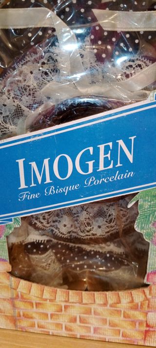 Coppia di Bambole in Porcellana vintage.