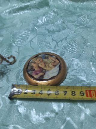 Cornice con alzatina dorata