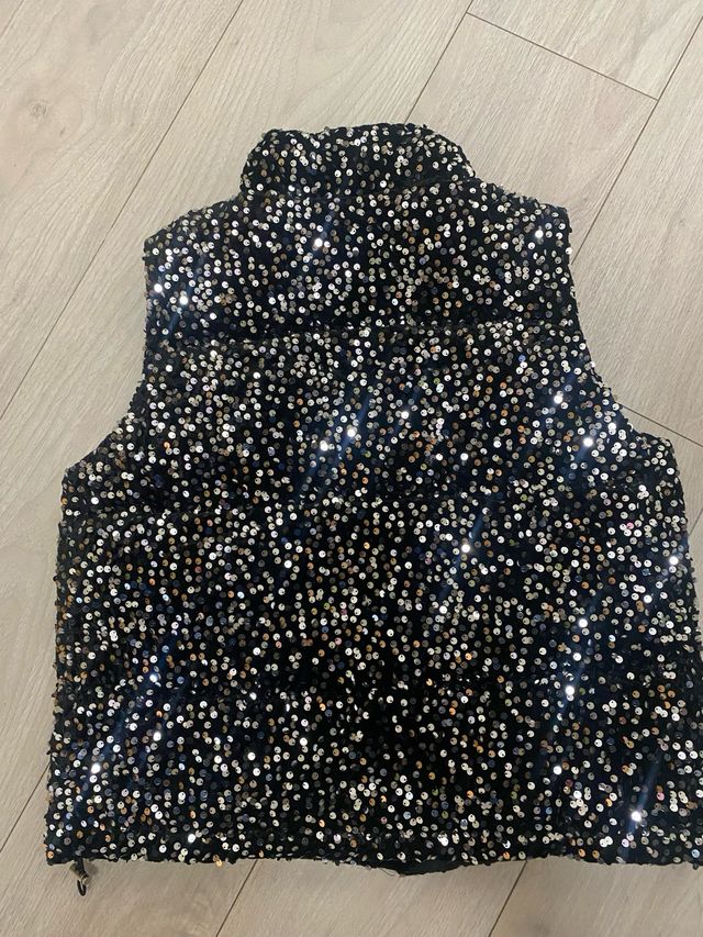 Chaleco acolchado lentejuelas negro/plata