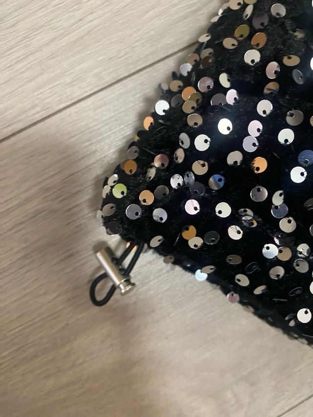 Chaleco acolchado lentejuelas negro/plata