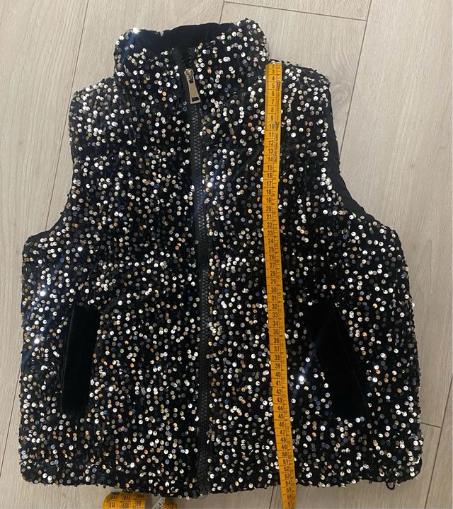 Chaleco acolchado lentejuelas negro/plata