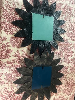 Coppia di specchi decorativi sole