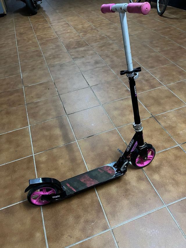 Patinete Oxelo rosa y negro