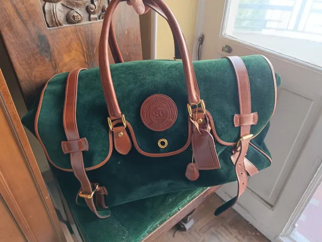 Bolsa de viaje de piel verde y marrón