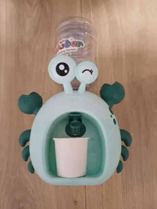 Dispensador de agua de juguete