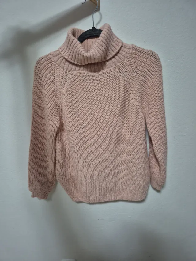 Jersey de punto rosa cuello alto