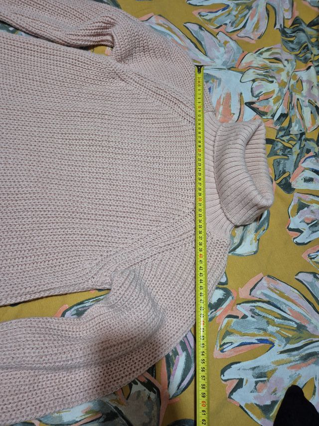 Jersey de punto rosa cuello alto