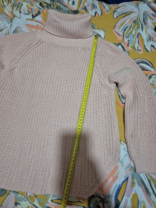 Jersey de punto rosa cuello alto