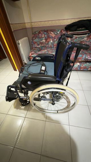 Silla de ruedas eléctrica como nueva