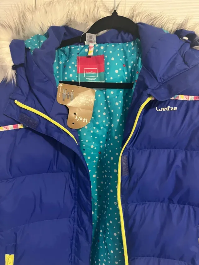 Bumino bambino blu con cappuccio e pelliccia