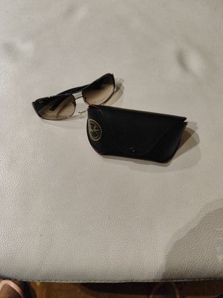 Gafas de sol Ray-Ban negras y marrones