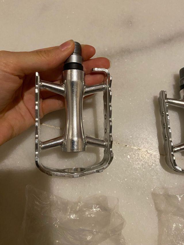 Par de pedales de acero inoxidable