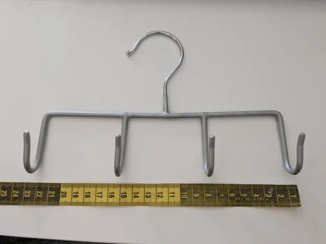 Percha para cinturones y accesorios