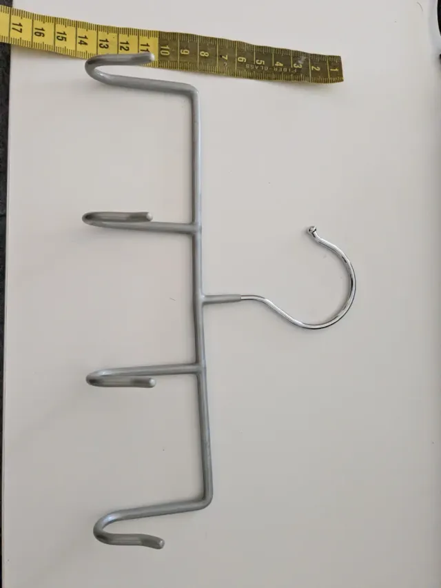 Percha para cinturones y accesorios