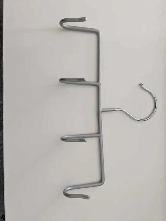 Percha para cinturones y accesorios