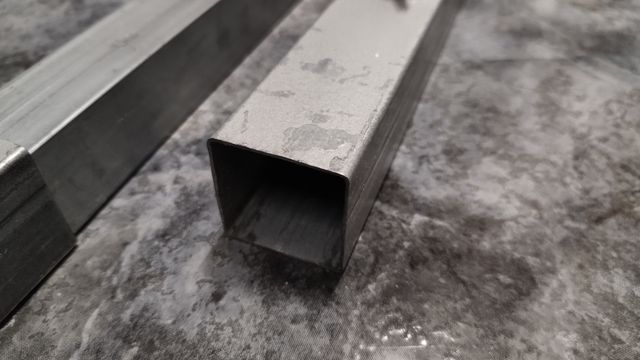 Regle telescópico galvanizado